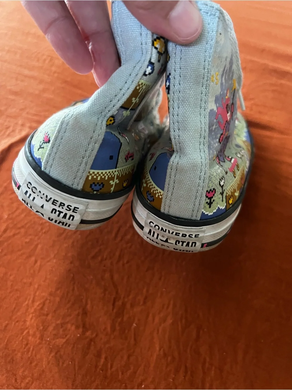 Converse Light Blue High-Top Sneakers with Pink Logo